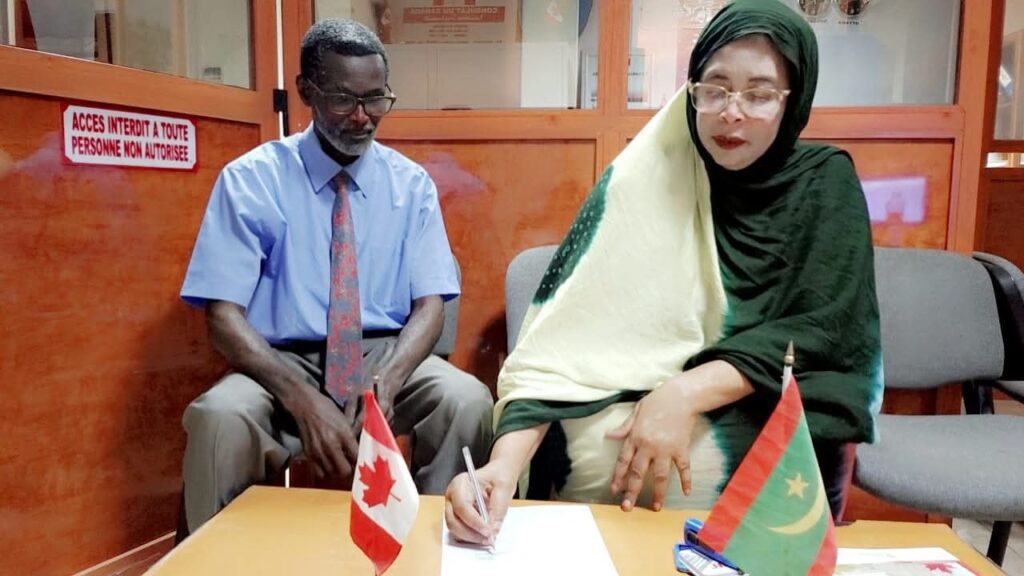 توقيع عمل مشترك بين رئيسة الجمعية مع الهيئة الكندية